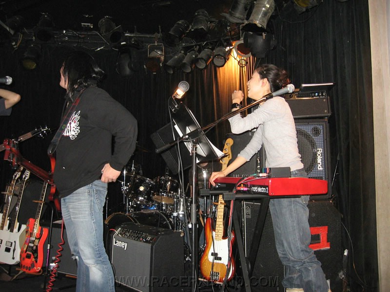 01. During sound check, Emi and Mike talk to Paul during a break..jpg