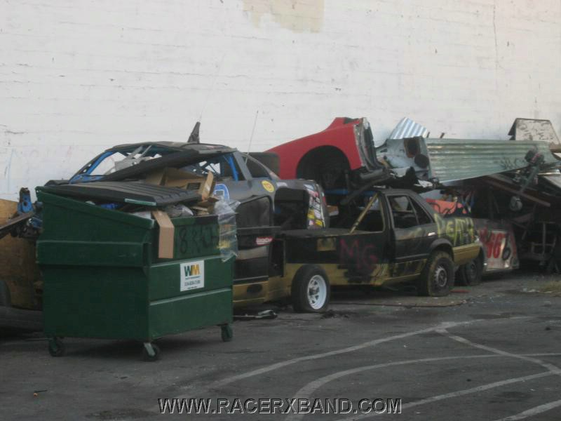 44. Piles of cars in the back..the black with blue car...is the smashed up Radio Control Racecar..jpg