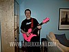 04. Jim holding the famed BC Rich guitar..jpg