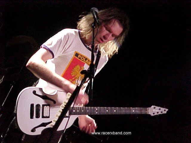 59. That's his baritone Guitar, tuned to B..jpg